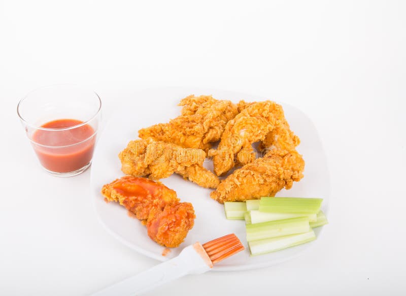 Chicken Strips on White Plate with Hot Sauce Stock Photo Image of