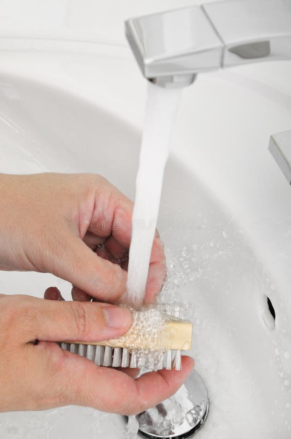 Brushing nails stock photo. Image of scrub, fingernail 10452072