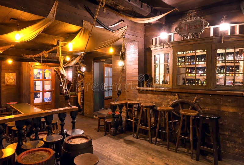 Interior of Old Schooner Style Bar with Old Wooden Furniture