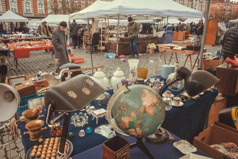 Street traders on flea market with old art, bargains and antique stuff, vintage decor and retro details stock image Street traders on flea market with old art, bargains and antique stuff, vintage decor and retro details stock image