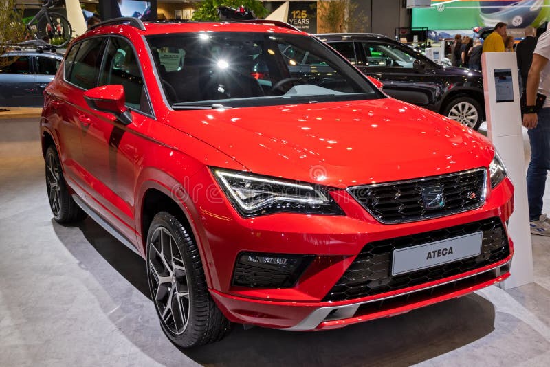 BRUSSELS - JAN 9, 2020: New Seat Ateca car model showcased at the Brussels Autosalon 2020 Motor Show. Red modern automobile type automotive autoshow motorshow royalty free stock photography BRUSSELS - JAN 9, 2020: New Seat Ateca car model showcased at the Brussels Autosalon 2020 Motor Show. Red modern automobile type automotive autoshow motorshow royalty free stock photography