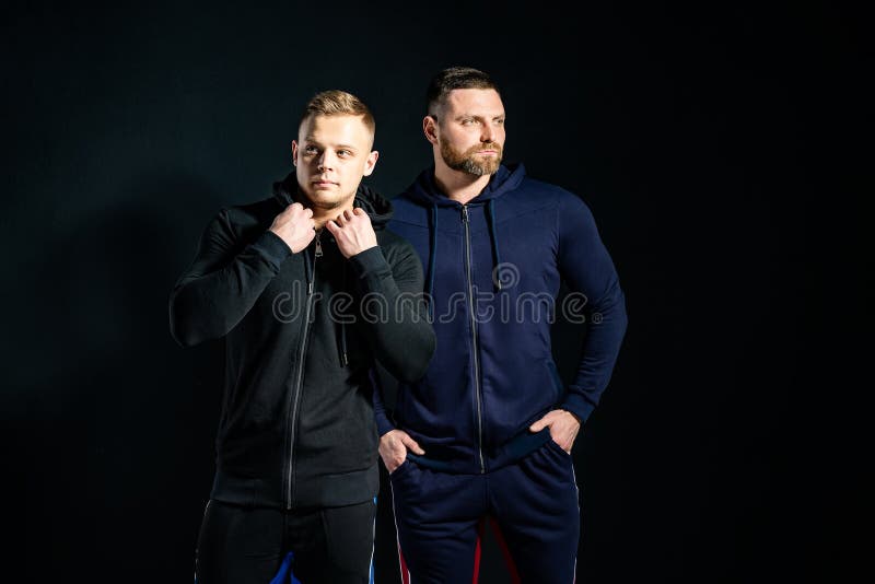 Trendy serious men in stylish sport suits royalty free stock photo Trendy serious men in stylish sport suits royalty free stock photo