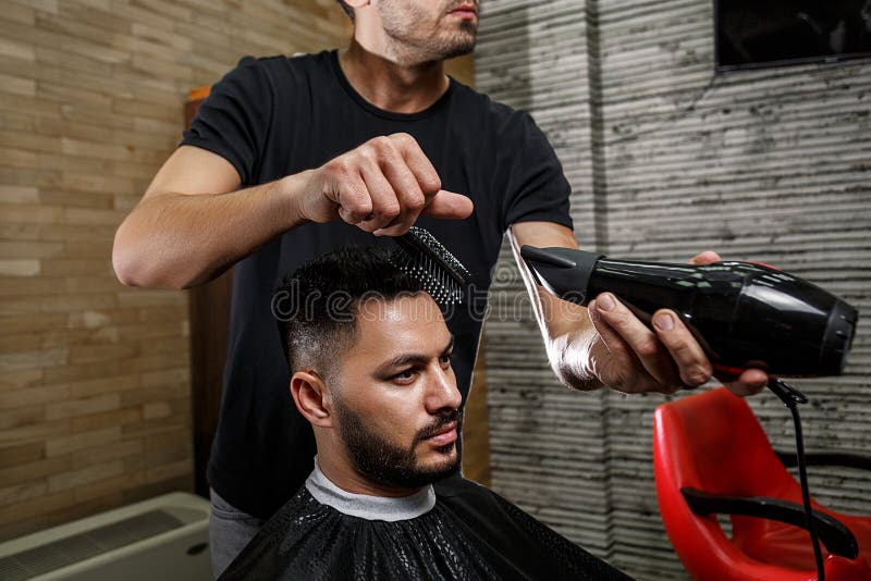 A Brutal-looking Barber Cuts the Hair of an Indian Guy. Cinematic Image Stock Photo - Image of head, indian: 175724098 A Brutal-looking Barber Cuts the Hair of an Indian Guy. Cinematic Image Stock Photo - Image of head, indian: 175724098