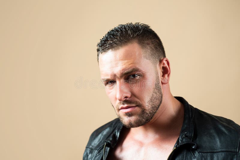 Brutal man, handsome serious male model. Close up portrait of guy with serious profile face. Closeup portrait of a young