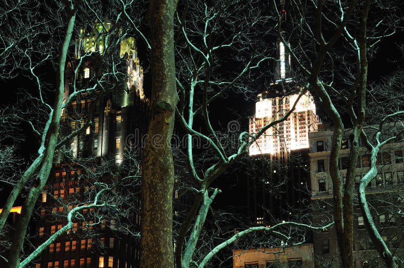 Bryant Park New York City at night with Empire State Building. Bryant Park New York City at night with Empire State Building