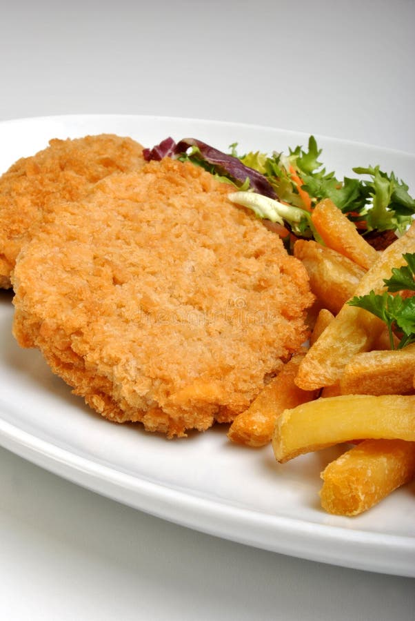 Bröad steak för fiskplattasallad royaltyfri bild