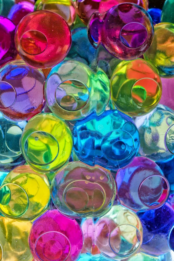 https://thumbs.dreamstime.com/b/btrightly-coloured-water-beads-macro-background-close-up-various-packed-together-glass-jar-266181068.jpg