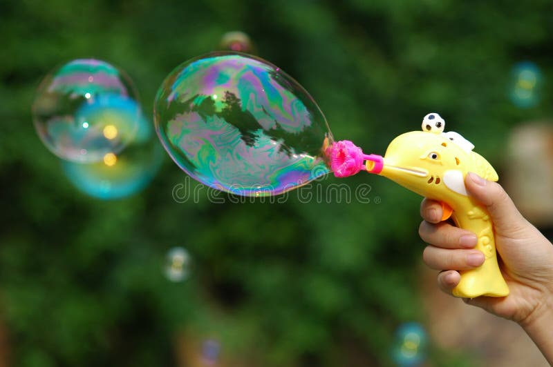 Bubble Gun stock photo. Image of colorful, multicolored 9942806