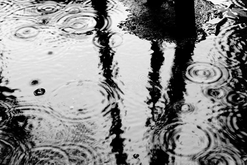 Bubble on Puddle Under the Rain on Autumn in Buenos Aires Stock Photo