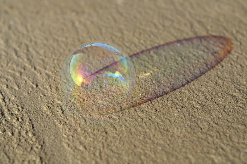 Bubble in the sand stock image. Image of bubbles, soap 32578291