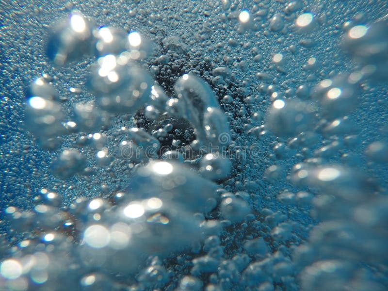 Bubbles in the pool stock image. Image of float, hover 12562353