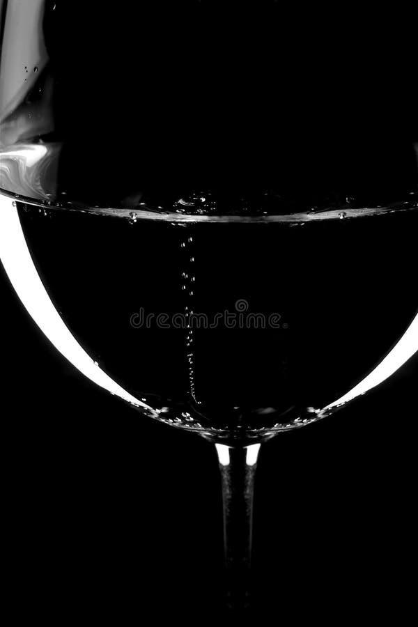 Bubbles rising in a glass of water