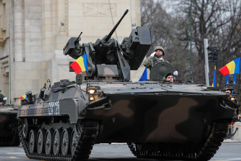 bucharest-romania-december-mli-m-combat-armored-vehicle-romanian-national-day-military-parade-passes-under-arch-triumph-166592430.jpg