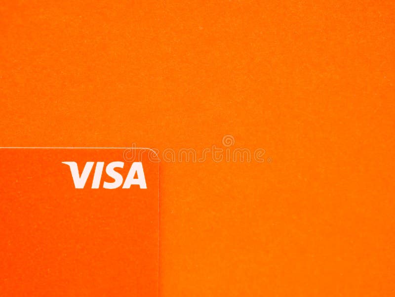 Orange Visa Credit or Debit Card on Gradient Background. Online