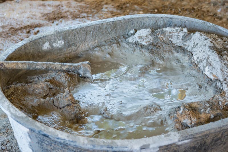 Bucket Cement Mix with on Construction Site the Ingredients. Brick, Stone,  Mortar, Sand Stock Image - Image of metal, architecture: 166350135