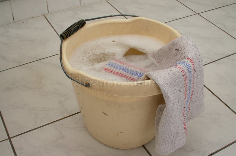 Washing Clothes In A Bucket Of Water. Stock Photo, Picture and Royalty Free  Image. Image 11764670.