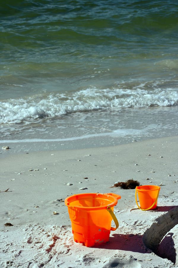Beach Buckets stock image. Image of buckets, green, sand 109933