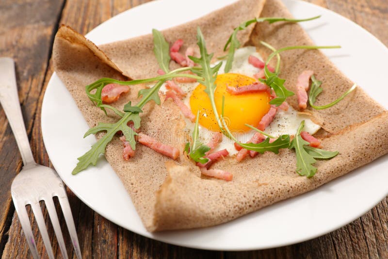 Buckwheat crepe with egg stock image. Image of cuisine 108357971