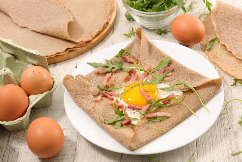Buckwheat crepe with egg stock image. Image of portion 108357973