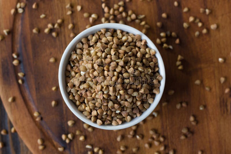 Buckwheat Grain on Ceramic Bowl Over Wooden Table. Stock Photo Image of bean, grain 95575964