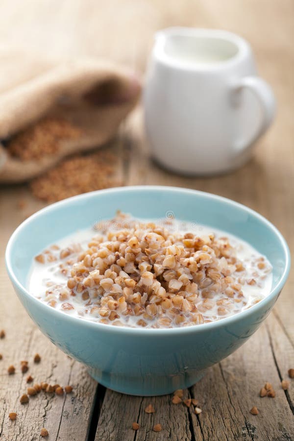 Buckwheat groats with milk stock image. Image of cooking 28790837