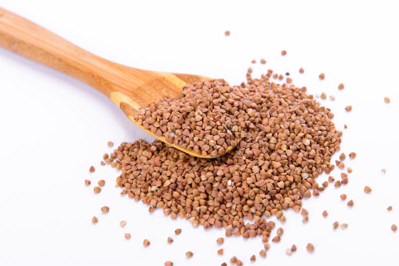 Buckwheat groats and spoon stock photo. Image of eating 39145050