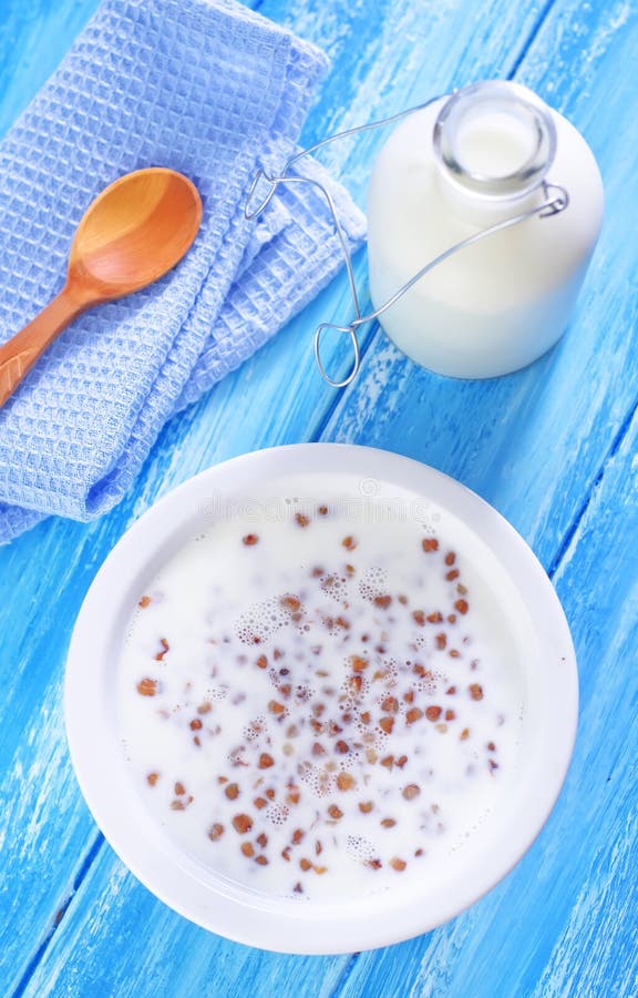 Buckwheat with milk stock image. Image of healthy, bowl 38377379