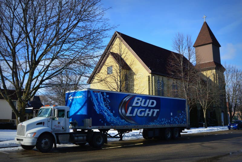 Bud Light Beer Truck Parked by a Church