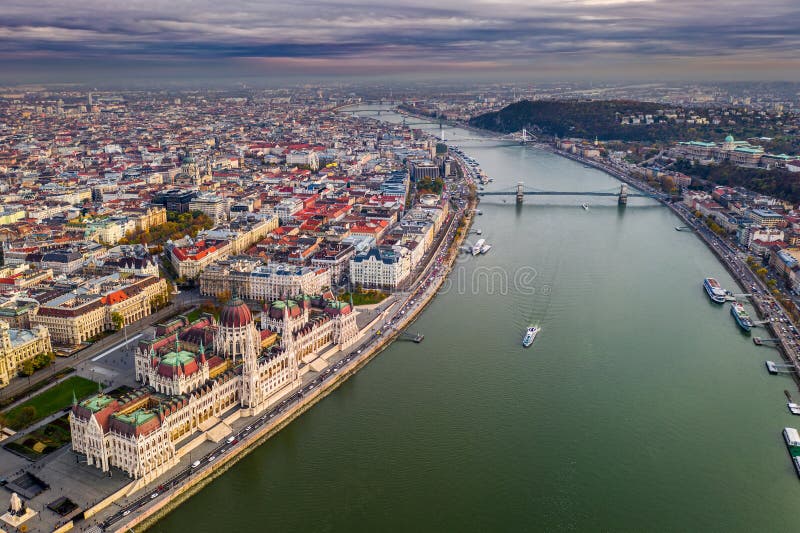 Budapest, Hungary - Aerial drone view of the beautiful Hungarian Parliament building at sunset with St. Stephen`s Basilica