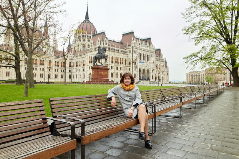Budapest, Hungary. beautiful girl sitting on a bench. 