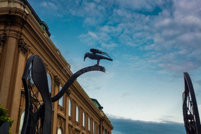 BUDAPEST, HUNGARY: Corvin Gate on St. George Square of Royal Palace of Budapest,with big black raven on top, symbolizing of King