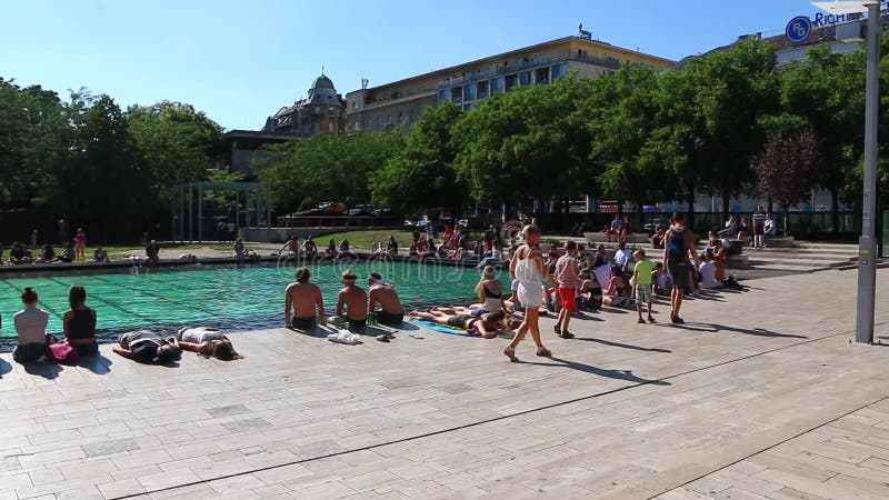 Budapest, Hungary - July 13th, 2017: Young people gathering in a park in Budapest Hungary . stock video Budapest, Hungary - July 13th, 2017: Young people gathering in a park in Budapest Hungary . stock video