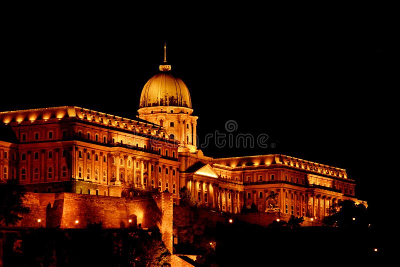 Budapest Hungary, 05. 29. 2019 Hungarian Parliament Building. night Budapest, glowing in gold. facade and roof of an old building.