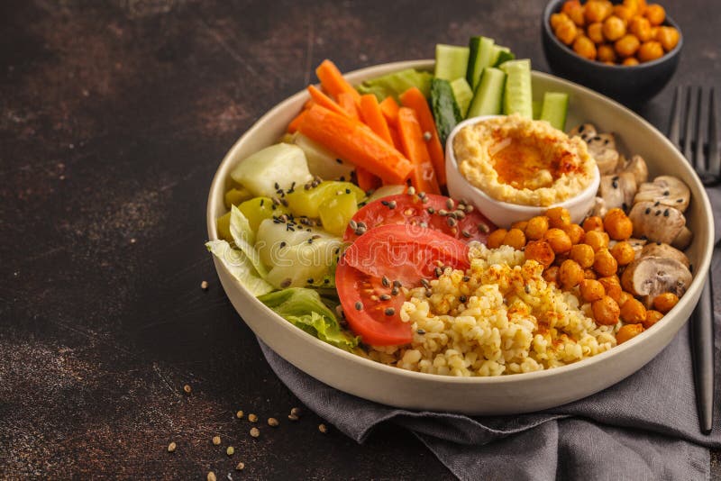 Buddha Bowl with Vegetables, Mushrooms, Bulgur, Hummus and Baked Stock ...