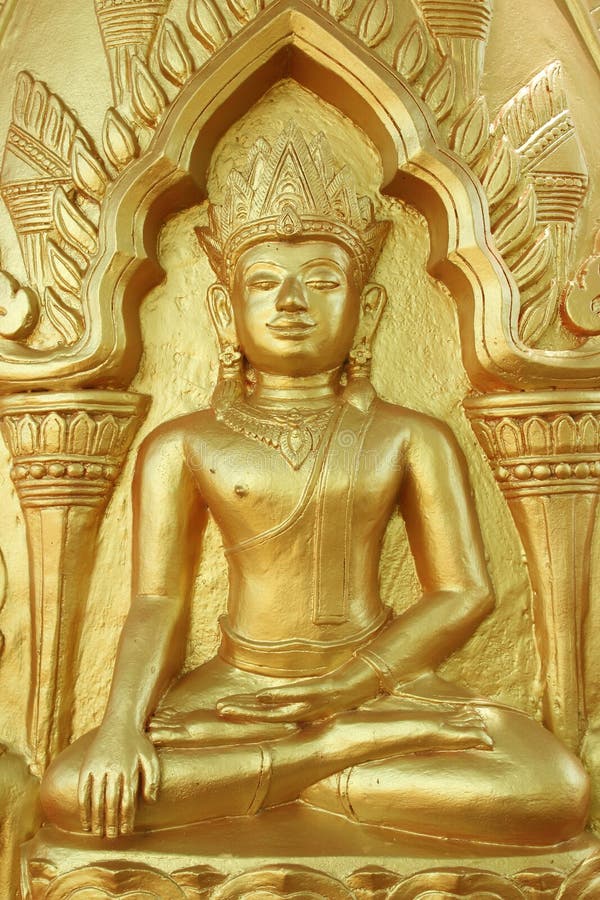 Buddha gold statue on golden background patterns royalty free stock image