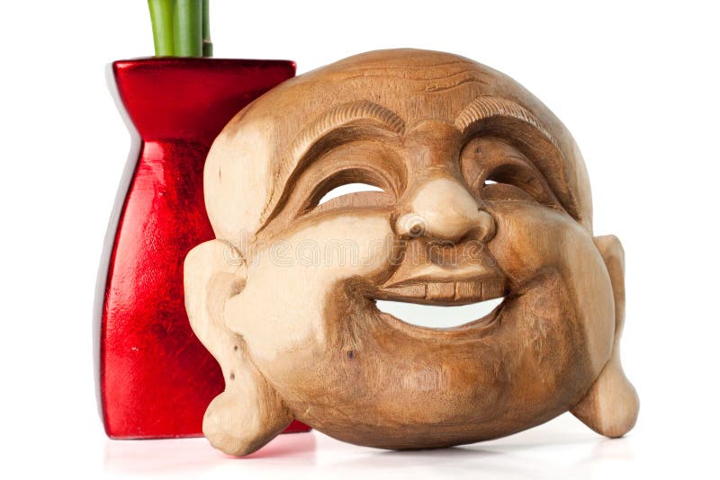 Buddha mask and vase stock images