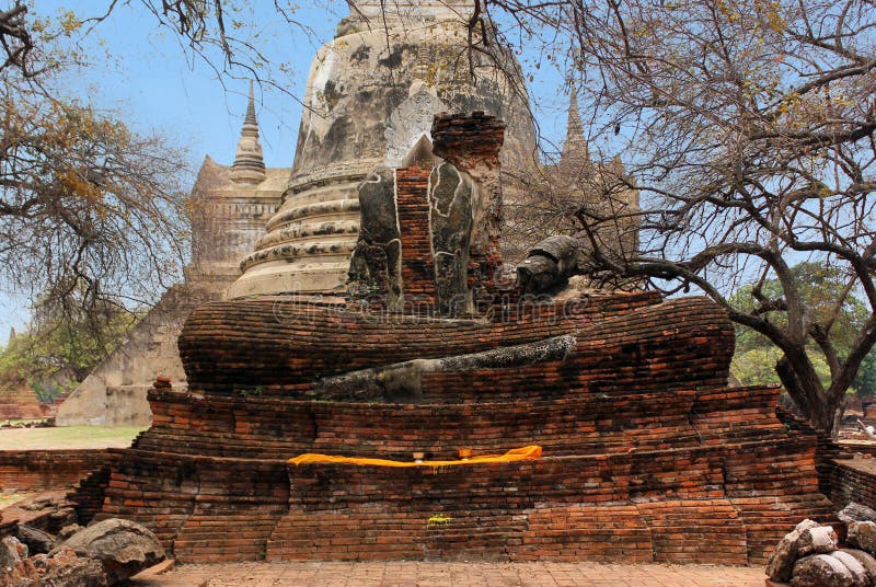 Buddha sculpture in the stone and brick ruins of the historic temple of Wat Phra Sri Sanphet. Ayutthaya, Thailand. royalty free stock image Buddha sculpture in the stone and brick ruins of the historic temple of Wat Phra Sri Sanphet. Ayutthaya, Thailand. royalty free stock image