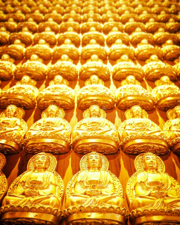 Buddha sculpture wall stock image. Image of golden, wall 65777641