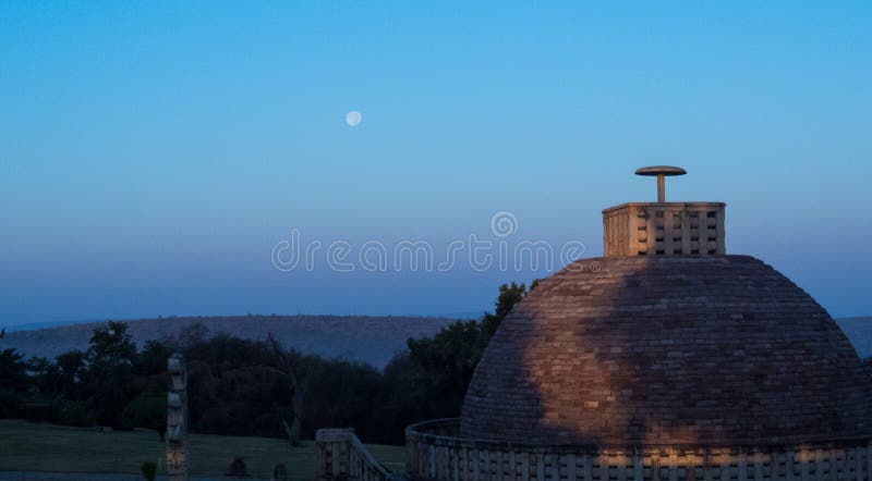 Buddha is smiling-Early morning moon in blue sky on Sanchi Stupa