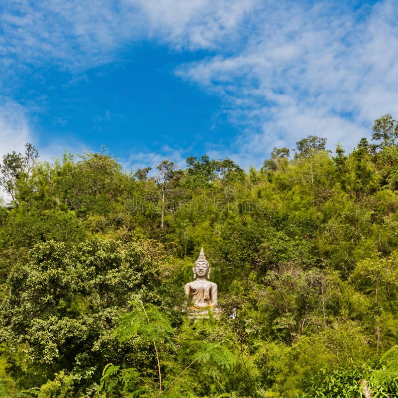 Buddha statue on mountain stock image. Image of blue 32077363