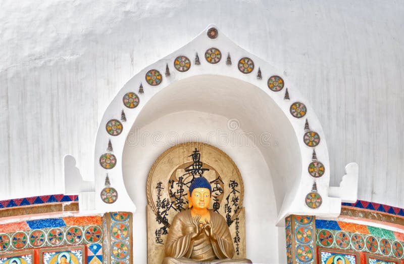 Buddha statue from Shanti Stupa stock image