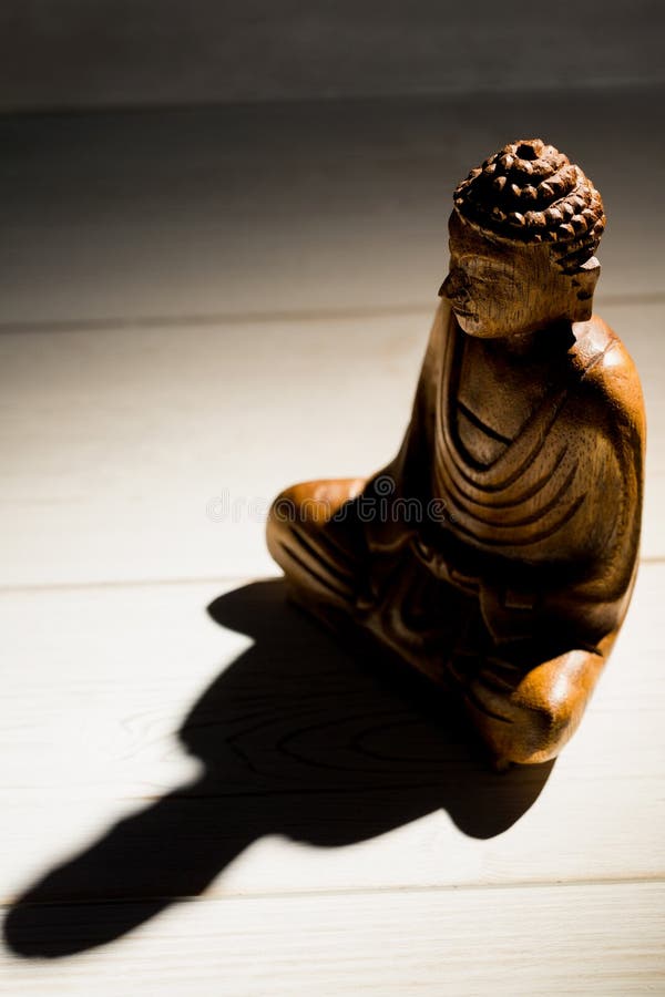Buddha statue on a table stock image. Image of statue 51629293