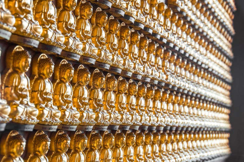 Buddha statue on the wall stock photo. Image of golden 85313818