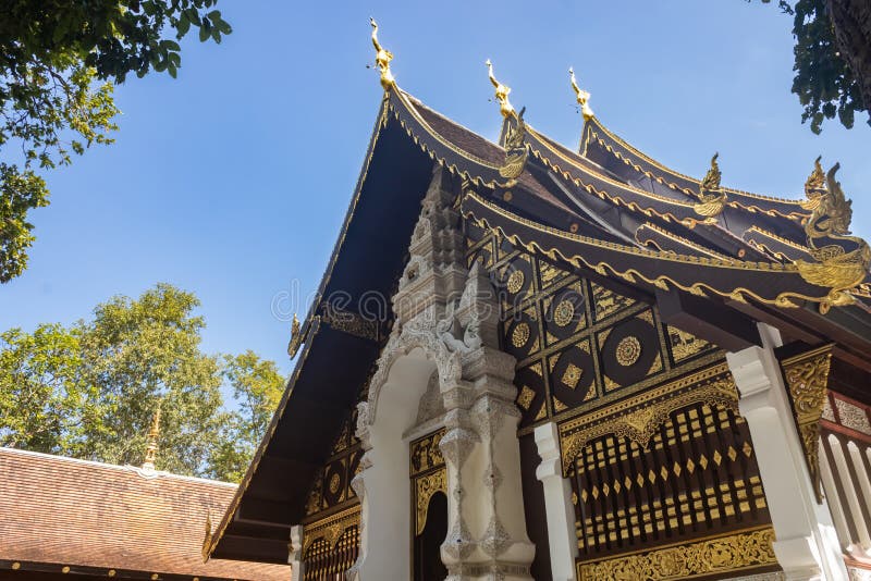 Buddhist Church in Analayo Temple in Low Angle View. Phayao, Thailand - Nov 24, 2019: Buddhist Church in Analayo Temple or Wat Analayo on Blue Sky Background in royalty free stock photography Buddhist Church in Analayo Temple in Low Angle View. Phayao, Thailand - Nov 24, 2019: Buddhist Church in Analayo Temple or Wat Analayo on Blue Sky Background in royalty free stock photography