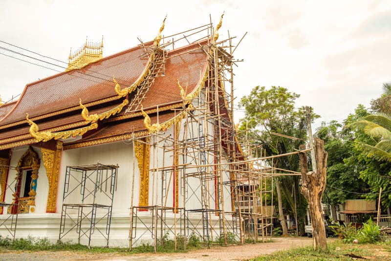 Buddhist church is built with traditional engineering. With scaffolding and bamboo frame, folkways concept royalty free stock image Buddhist church is built with traditional engineering. With scaffolding and bamboo frame, folkways concept royalty free stock image