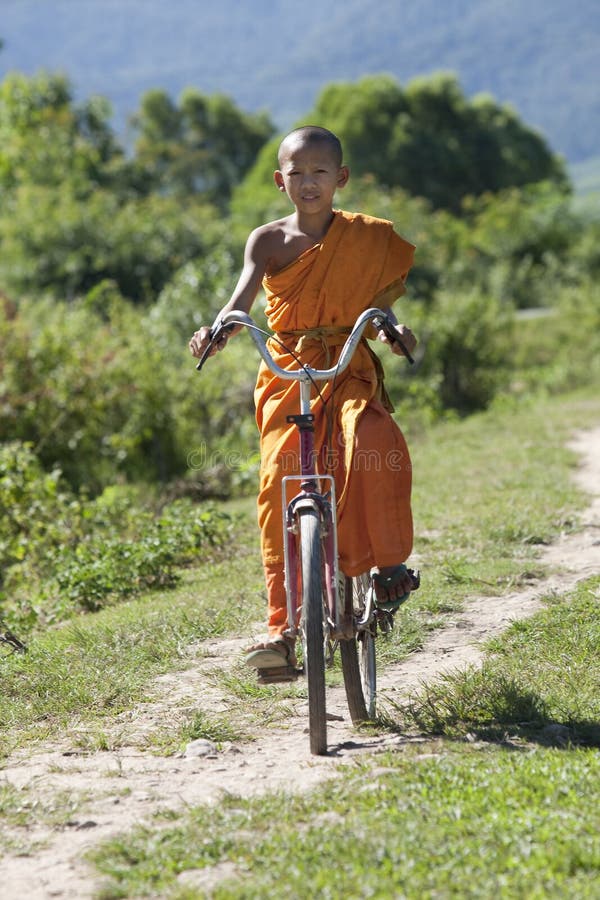 Buddhist monk on bicycle