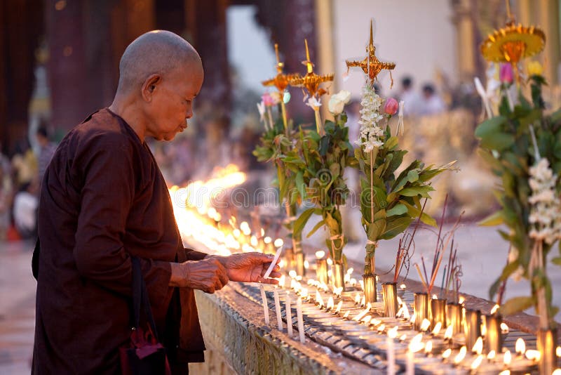 Buddhist Monk Lighting Candles Editorial Image Image of fire, faith