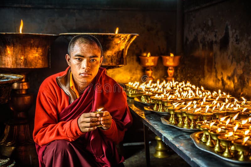 A Monk Lighting Incense Sticks Editorial Photography Image of