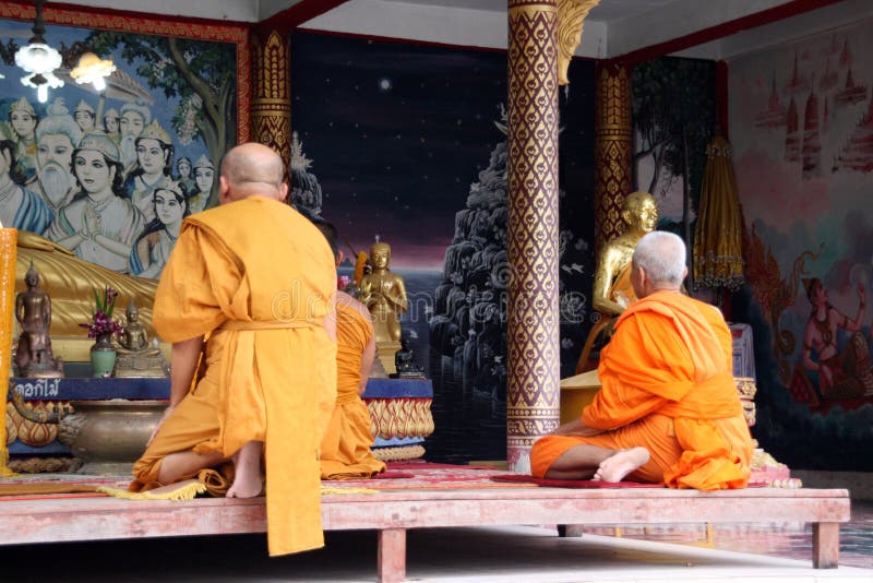 Buddhist monks praying