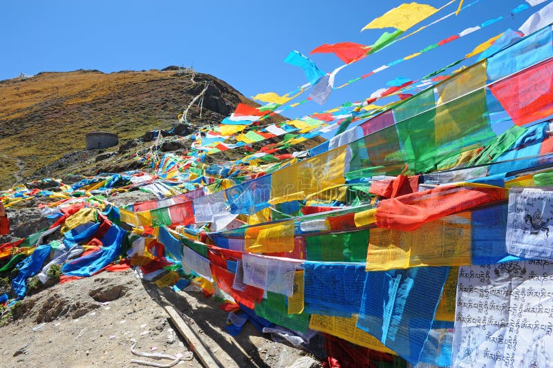 Buddhist prayer flags with blue sky